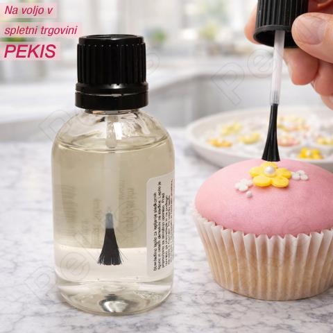 Slaščičarsko lepilo z integriranim čopičem za lažji nanos