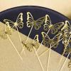 Dekoracija za muffine (12 kom) Zlati metuljčki